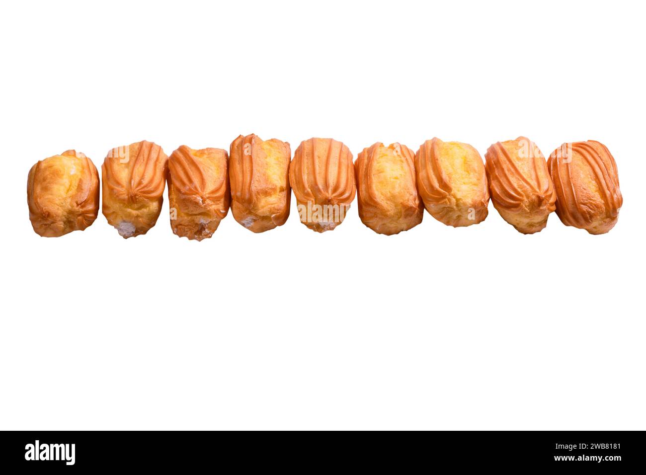 Sweet eclairs isolated on a white background. Top view. Stock Photo