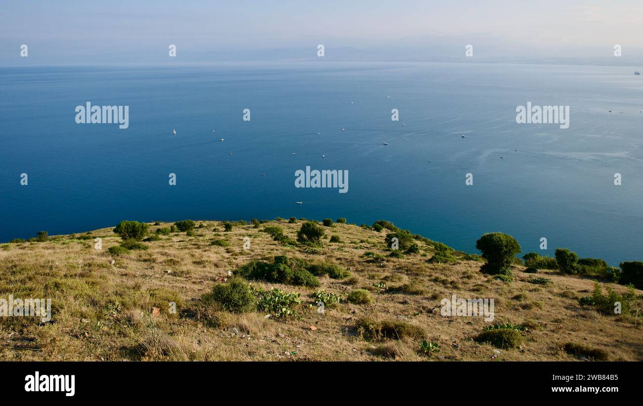 Northern Türkiye, Black Sea off the coast of Sinop. View of the Black Sea from the rocky mountain peak. Skyline, sea and rocky hill. Stock Photo