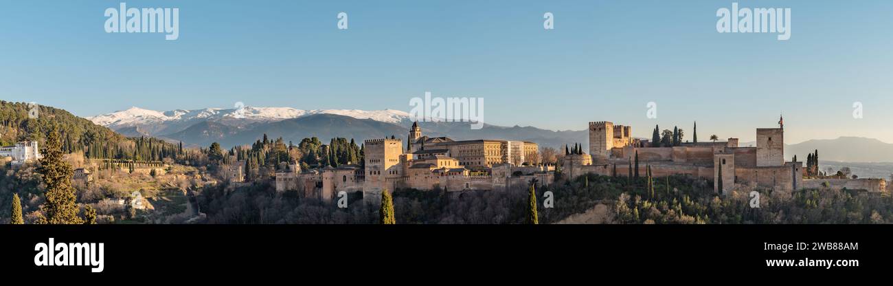 A Panoramic view of the Alhambra in Granada with the Sierra Nevada mountain in the background in Andalucia, Spain. Stock Photo