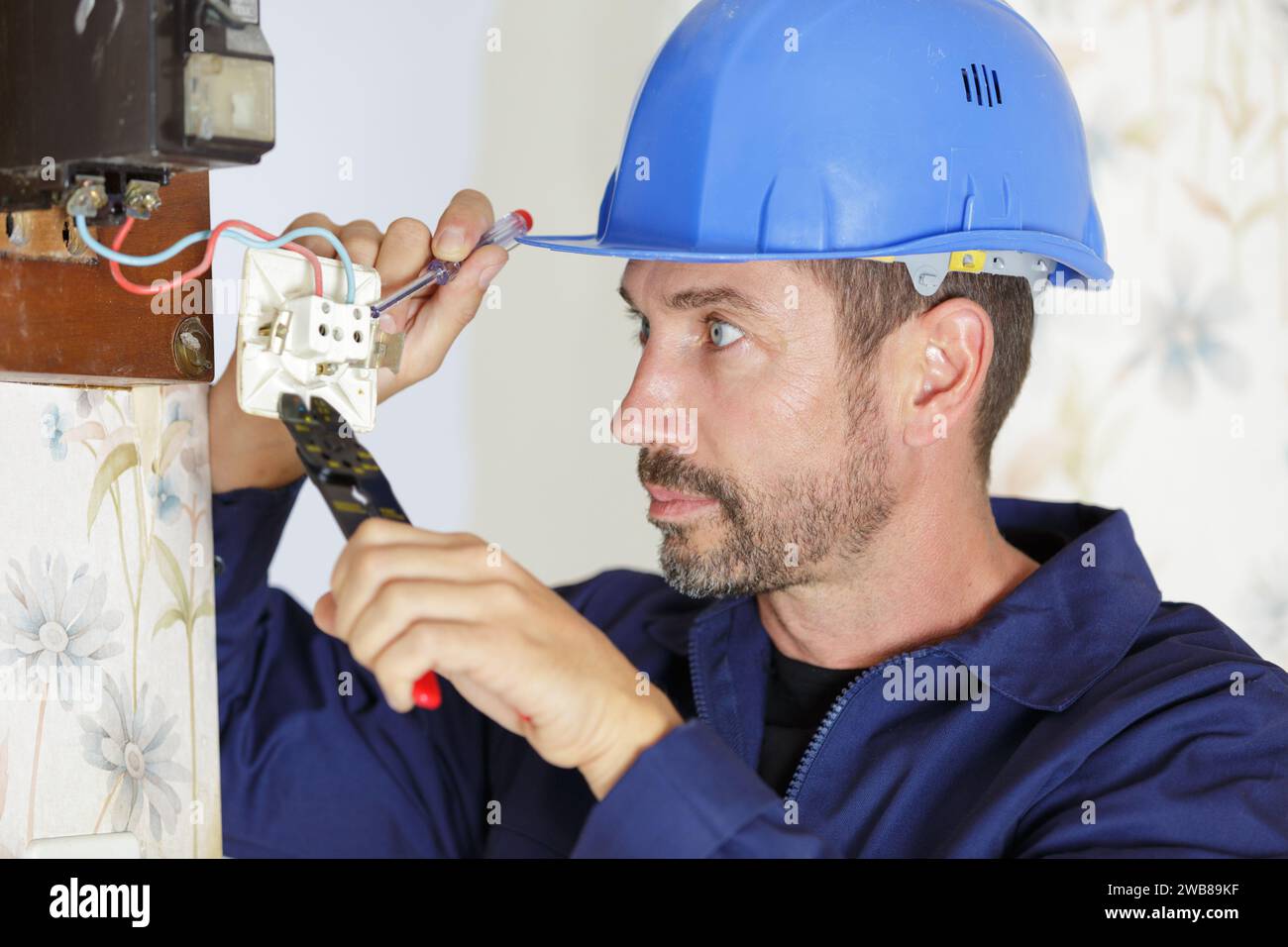 Electrician technician during socket hi-res stock photography and ...