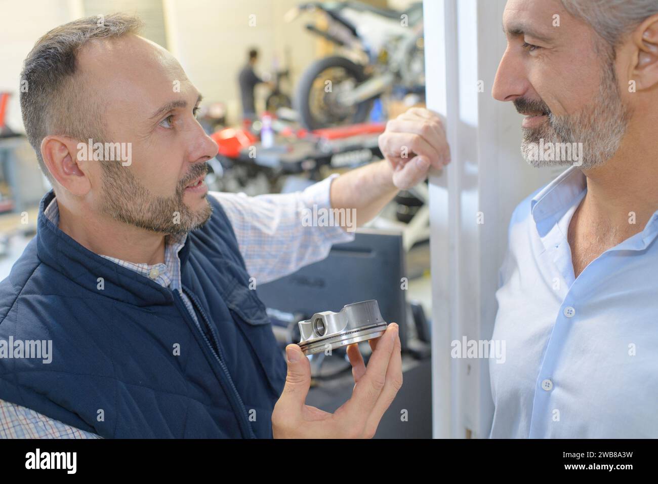 mechanical engineer checking equipment in factory Stock Photo