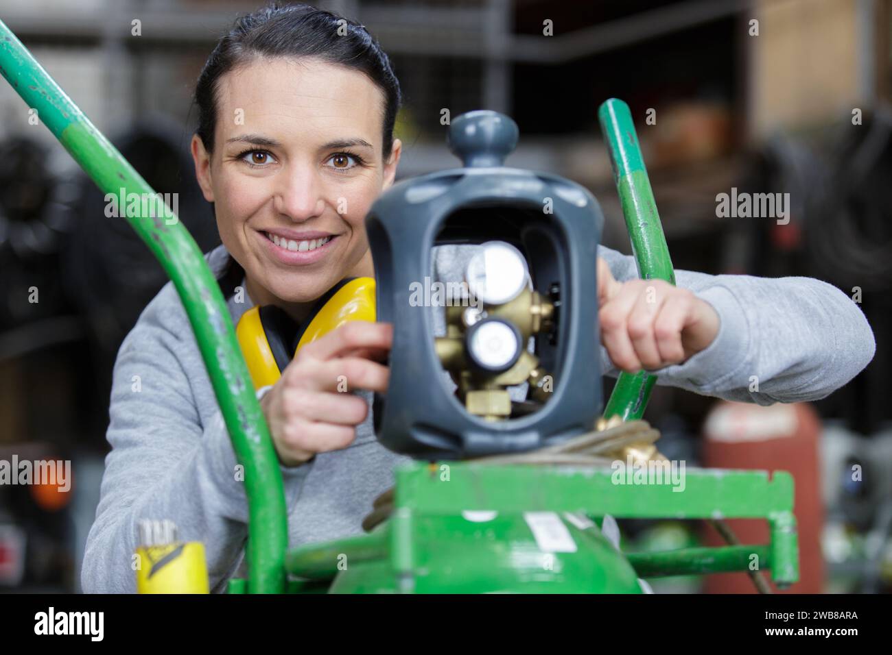 female professional machinist in metalworking industry Stock Photo - Alamy