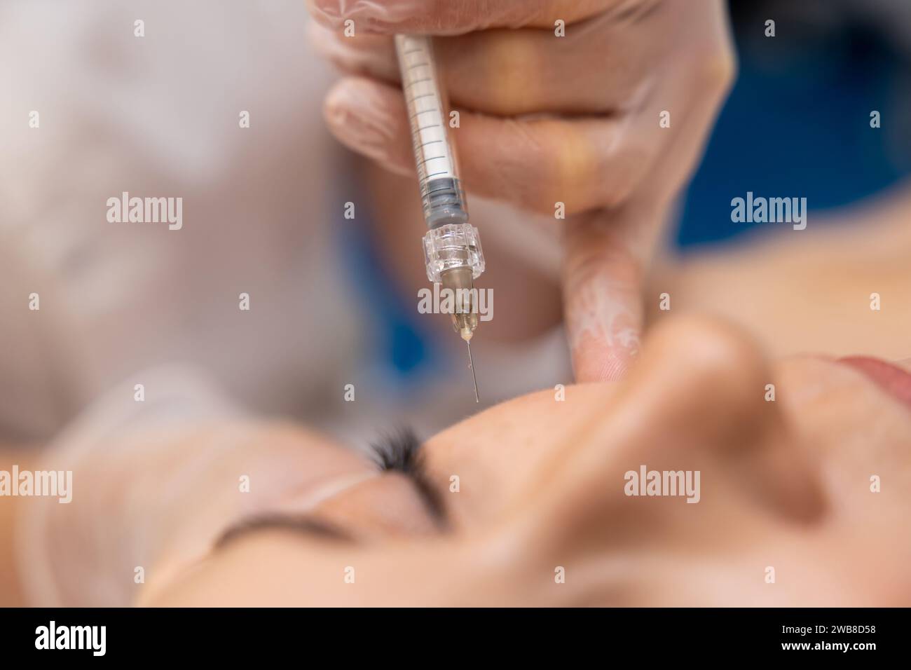 Mature woman receiving injections hi-res stock photography and images ...
