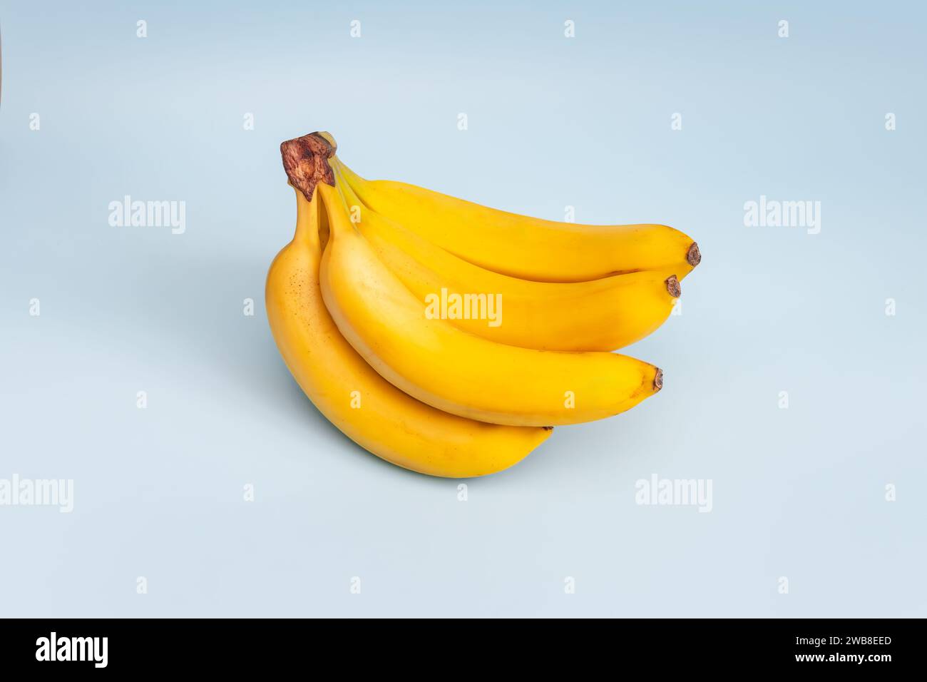 Fresh bananas on blue background. top view Stock Photo