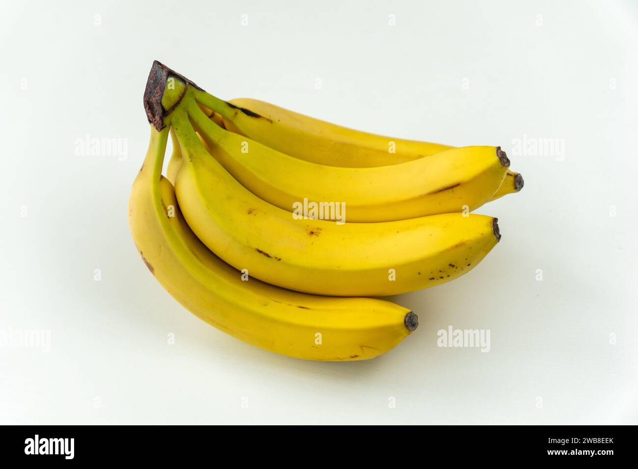 Top View of Yellow Banana Bunch on White Background. top view Stock Photo