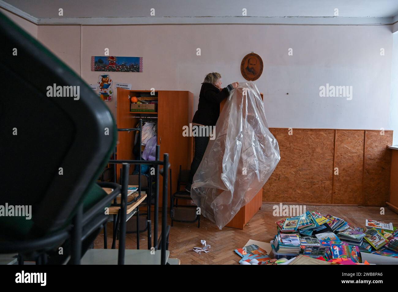 Non Exclusive LVIV, UKRAINE JANUARY 08, 2024 Primary school teacher Halyna covers a