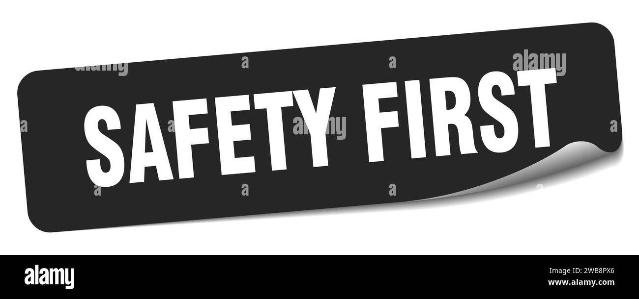 Safety first sticker Black and White Stock Photos & Images - Alamy
