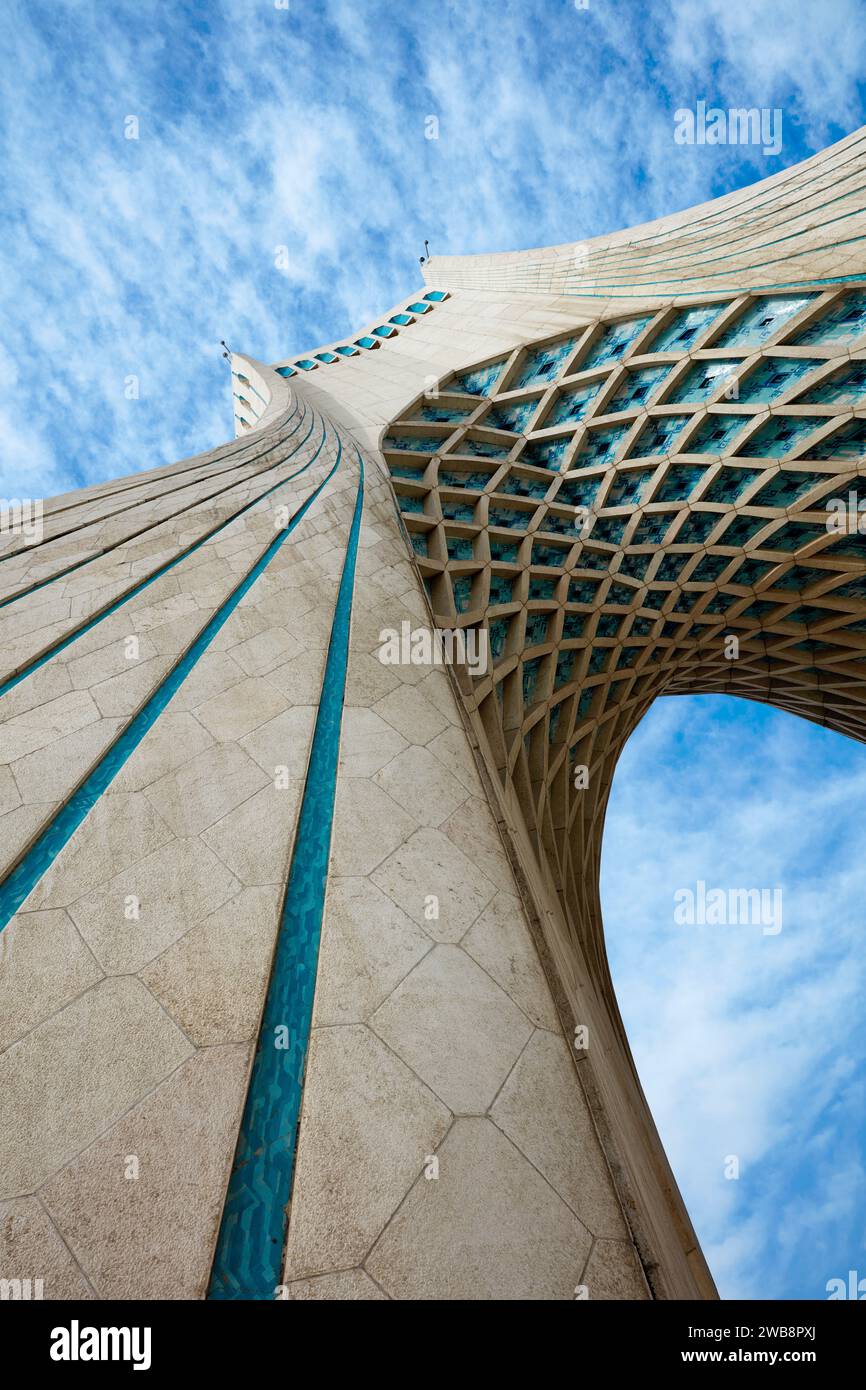 A low-angle view of the Azadi Tower (Freedom Tower), an iconic landmark in Tehran, Iran. Stock Photo