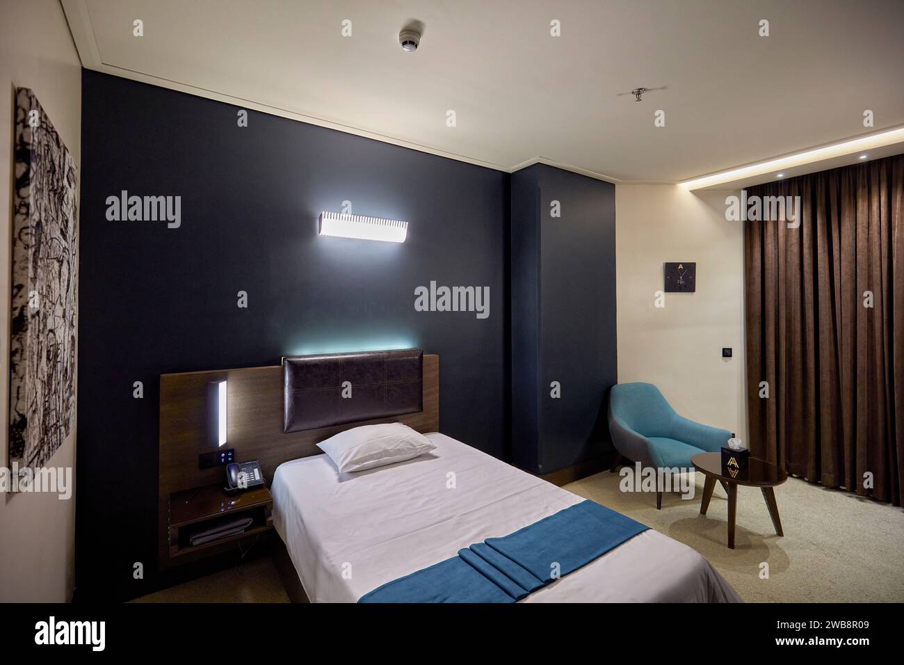Interior view of a single room in the Atana Hotel in Tehran, Iran. Stock Photo
