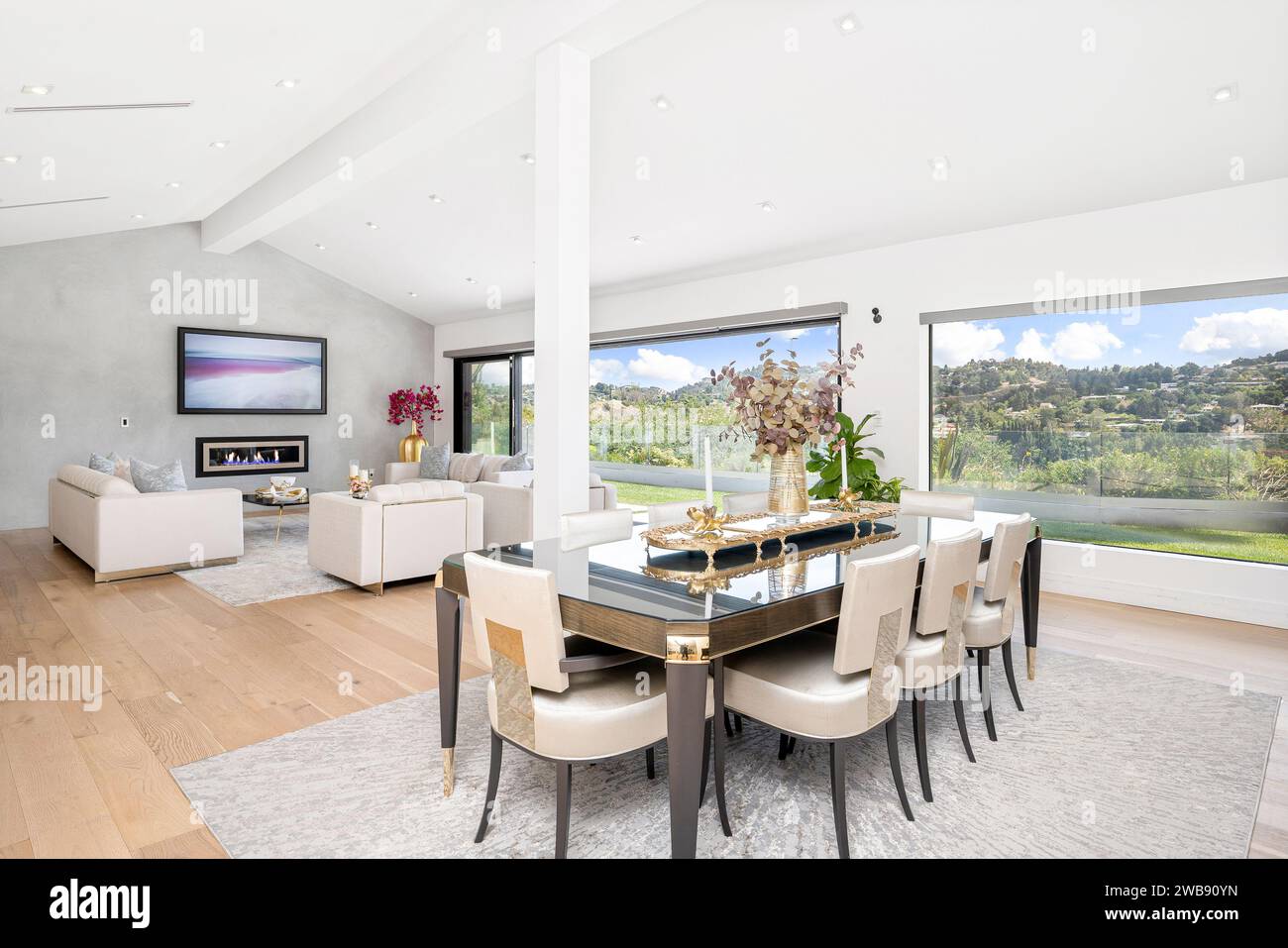 A luxury home features a spacious dining room with stunning views Stock ...