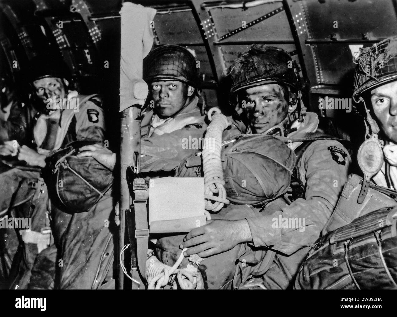 ENGLAND, UK - 05 June 1944 - See You in Berlin...The resolute faces of paratroopers from the 101st Airborne Division (Air Assault) just before they to Stock Photo