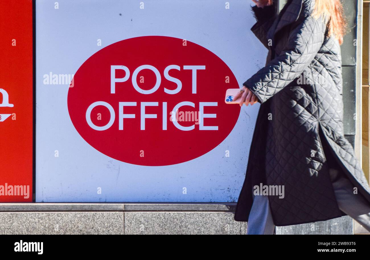 London, England, Uk. 9th Jan, 2024. A person walks past a post office ...