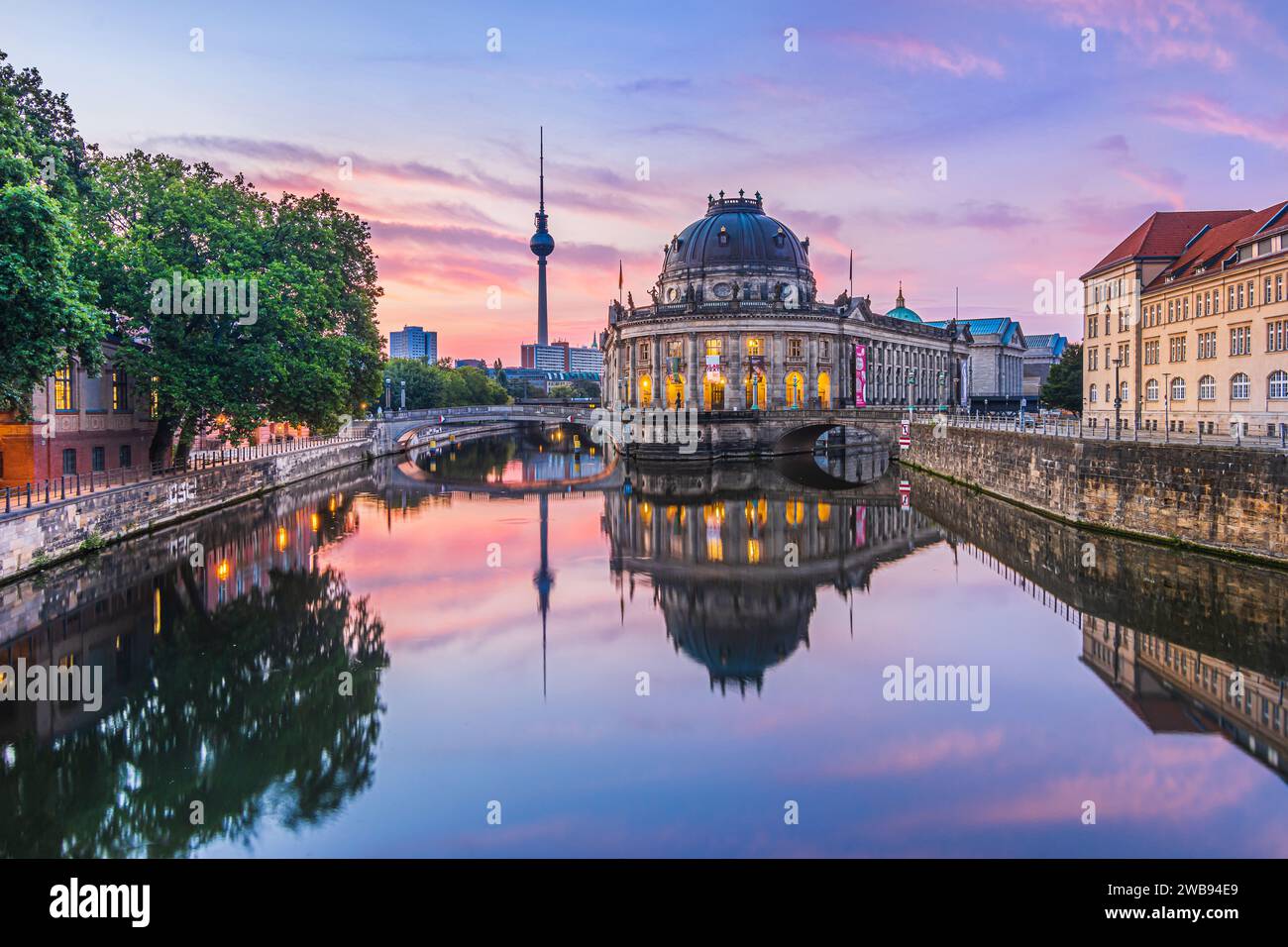 Sunrise in Berlin. Skyline in the center of the capital of Germany. Historical buildings on the Museum Island and television tower with reflections Stock Photo