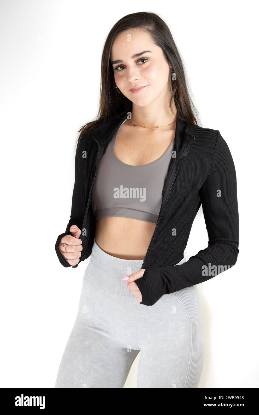 pretty fitness model posing in athletic wear Stock Photo - Alamy