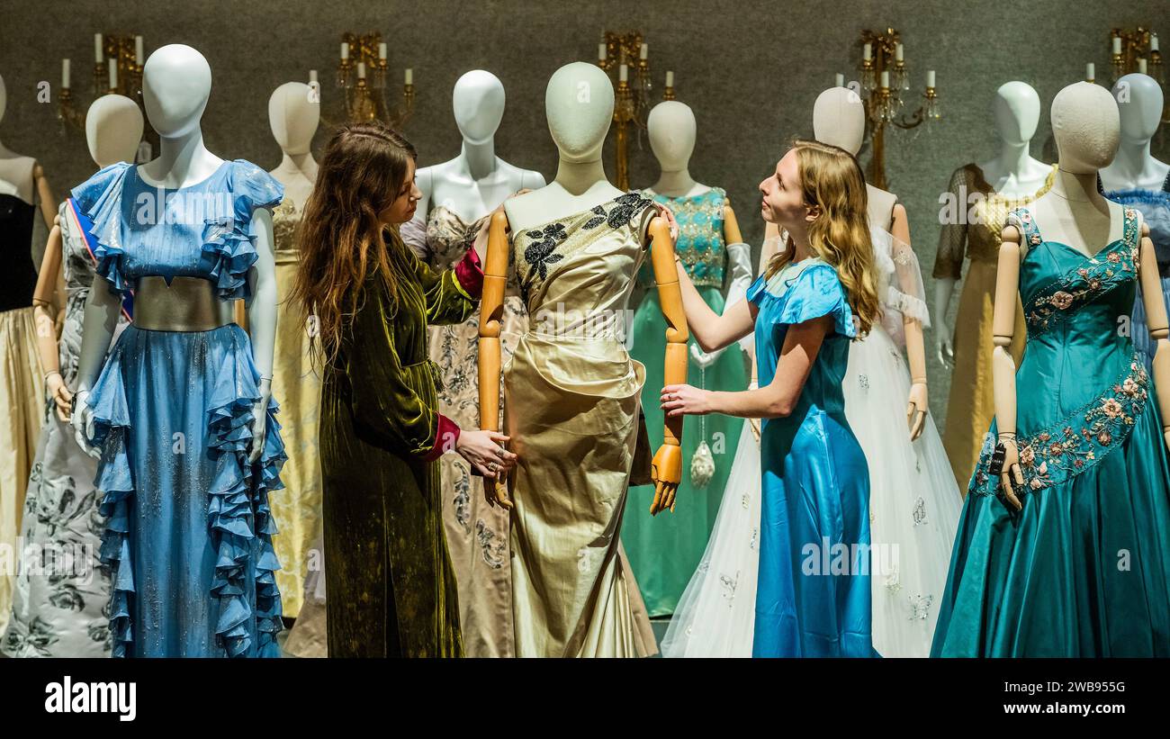 London, UK. 9 Jan 2024. Some of the many dresses including a Full-length teal ballgown, featured in the promotional poster ( © Netflix 2020, Inc.) worn by ClareFoy in Season 2 Episode 1 and Episode 4. Estimate: £3,000-5,000 and one worn by Lia Williams (as Wallis Simpson): A full-length column ballgown in Season 1, Episode 5, 'Smoke and Mirrors', £1,500 - £2,000 - A preview of The Crown Auction at Bonhams New Bond Street, London. More than 450 costumes, sets, and props from the award-winning series The Crown, a Netflix show. Credit: Guy Bell/Alamy Live News Stock Photo