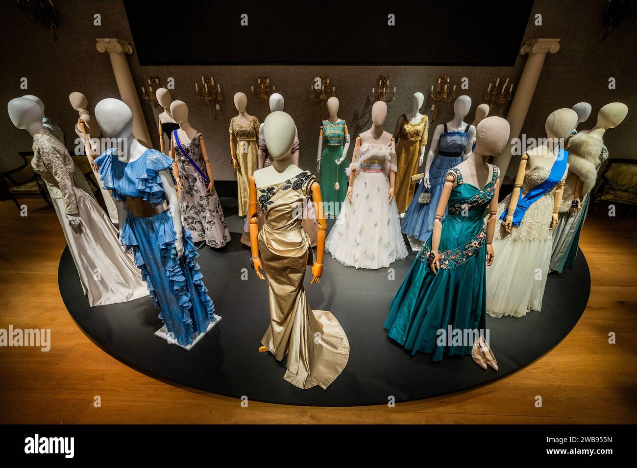 London, UK. 9 Jan 2024. Some of the many dresses including a Full-length teal ballgown, featured in the promotional poster ( © Netflix 2020, Inc.) worn by ClareFoy in Season 2 Episode 1 and Episode 4. Estimate: £3,000-5,000 and one worn by Lia Williams (as Wallis Simpson): A full-length column ballgown in Season 1, Episode 5, 'Smoke and Mirrors', £1,500 - £2,000 - A preview of The Crown Auction at Bonhams New Bond Street, London. More than 450 costumes, sets, and props from the award-winning series The Crown, a Netflix show. Credit: Guy Bell/Alamy Live News Stock Photo