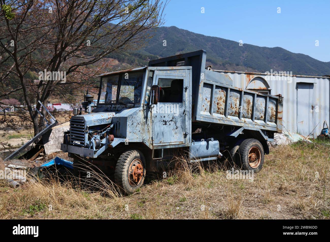 Old rusty truck left unused in rural South Korea. Gyeongsangnam-do province. Stock Photo