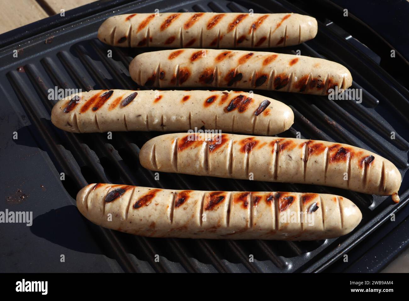 German food. Thuringian white sausage on a barbecue. Thuringia region ...