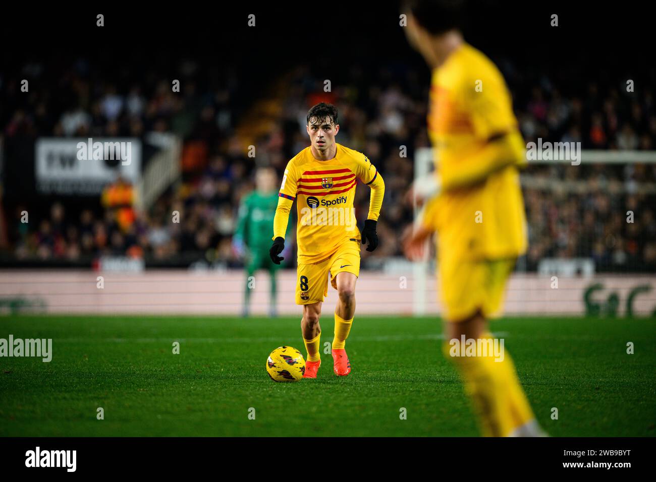 Pedri, FC Barcelona's Spanish player in action during a league match at the Mestalla stadium, Valencia, Spain. Stock Photo