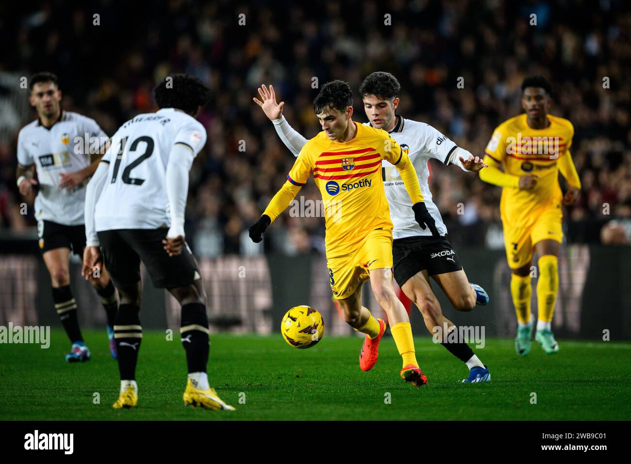 Pedri, FC Barcelona's Spanish player in action during a league match at the Mestalla stadium, Valencia, Spain. Stock Photo