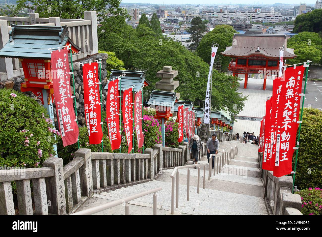 INUYAMA, JAPAN - MAY 3, 2012: People walk the stairs to Narita-San Temple in Inuyama, Japan. The Shingon sect Buddhist temple was opened in 1953. Stock Photo