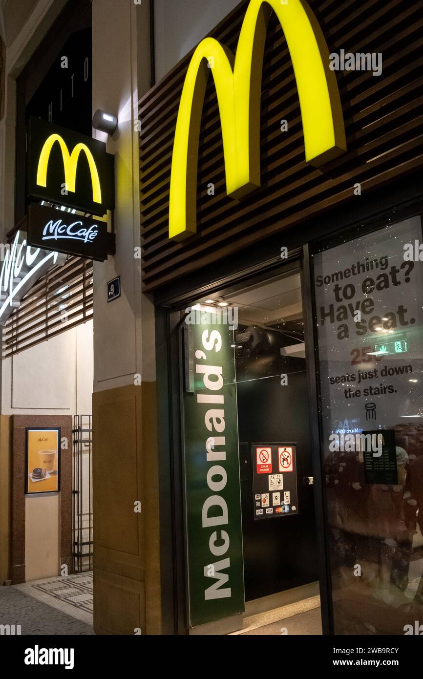 Prague, CZ 08 December 2022 Prague Nightlife. Neon sign with logo of