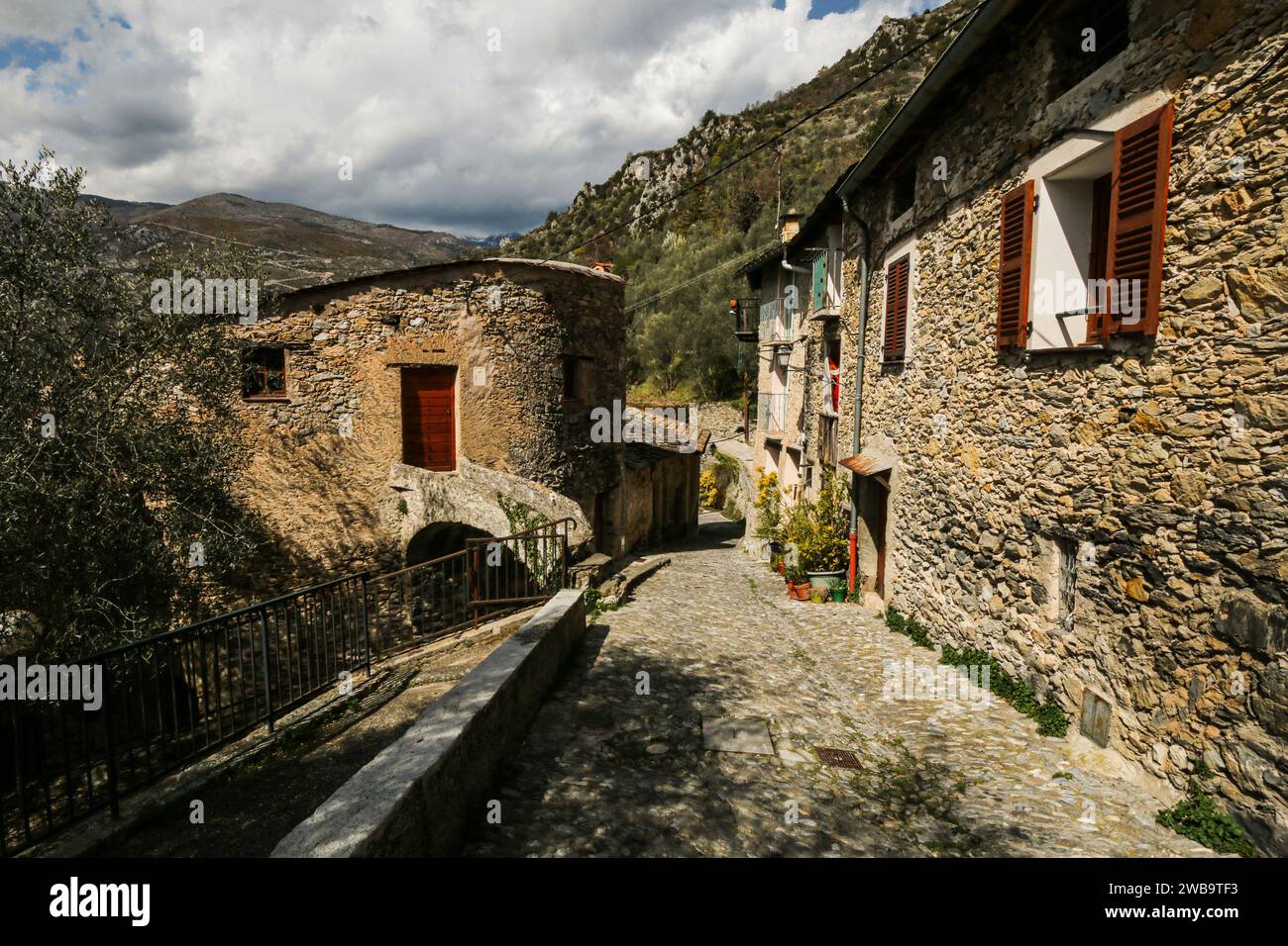 Stone path in Saorge, a medieval village in Alpes-Maritimes department, vallée de La Roya, PACA region, south-east France Stock Photo