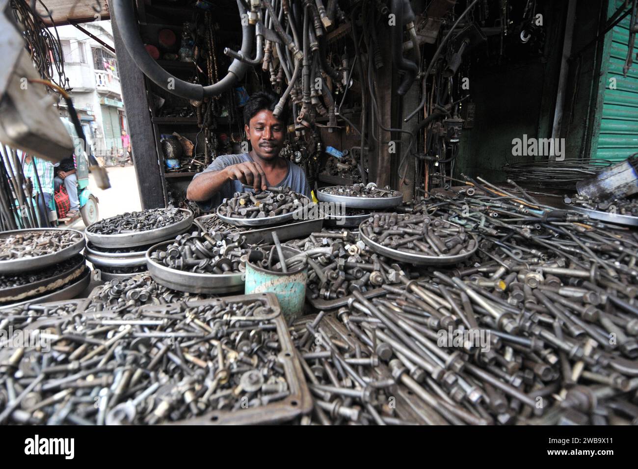 Sellers sell old car parts at the old car parts market in Dholaikhal, Old Dhaka. Dholaikhal is