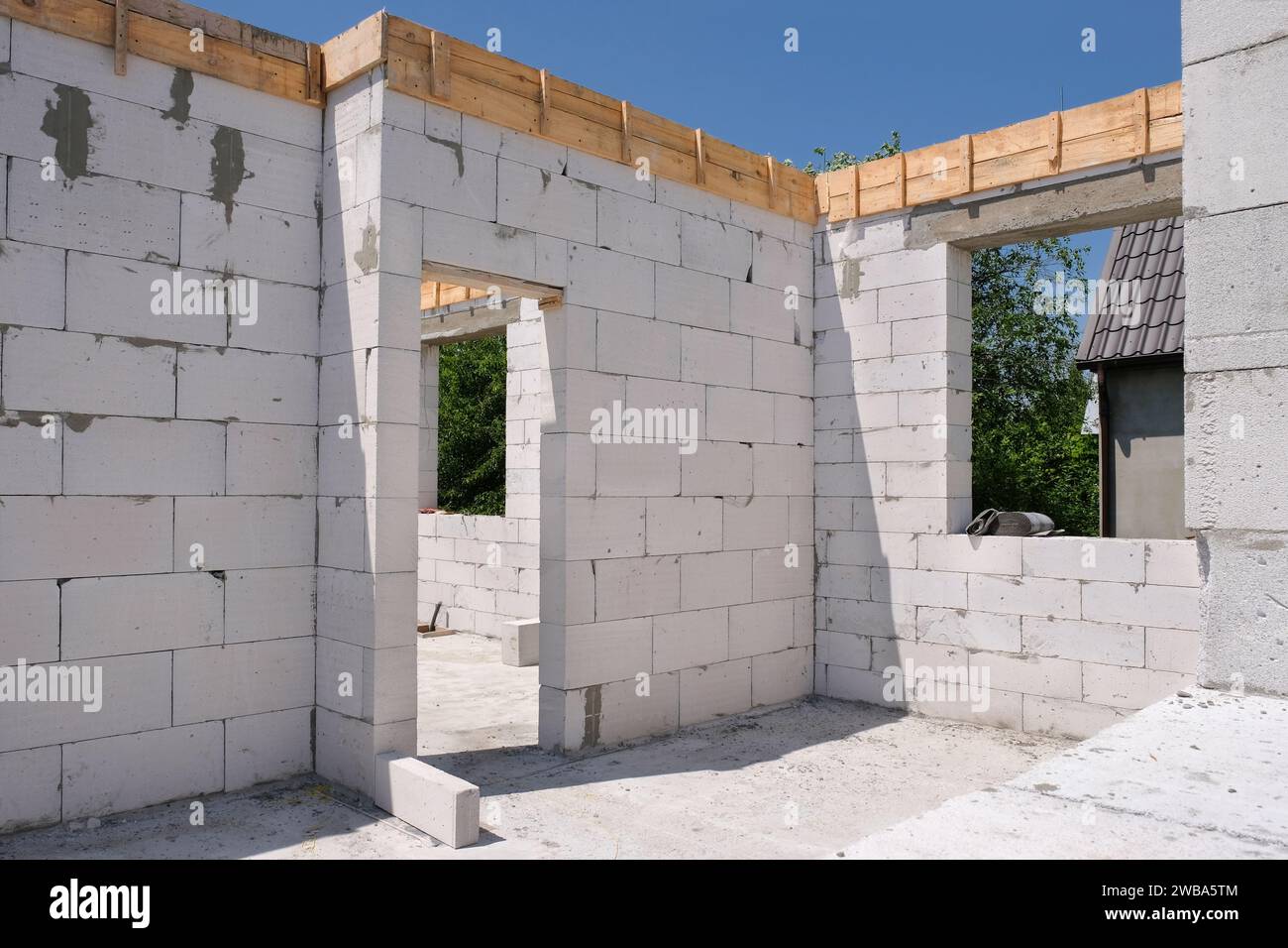 Building a house from white aerated concrete blocks. Construction ...