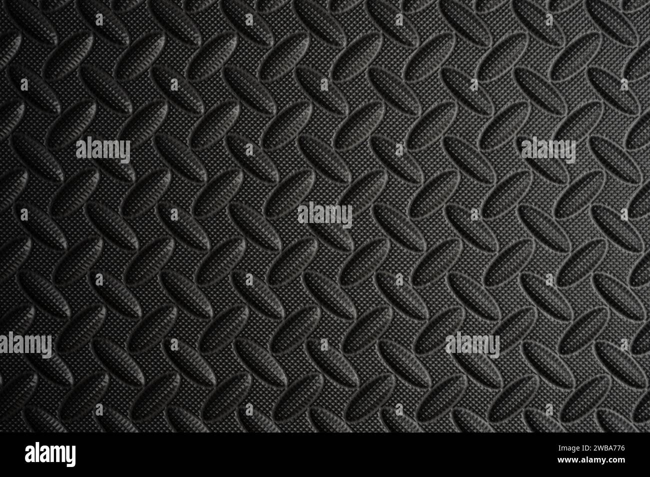 Black durable gradient background. Surface of industrial plastic panel Stock Photo
