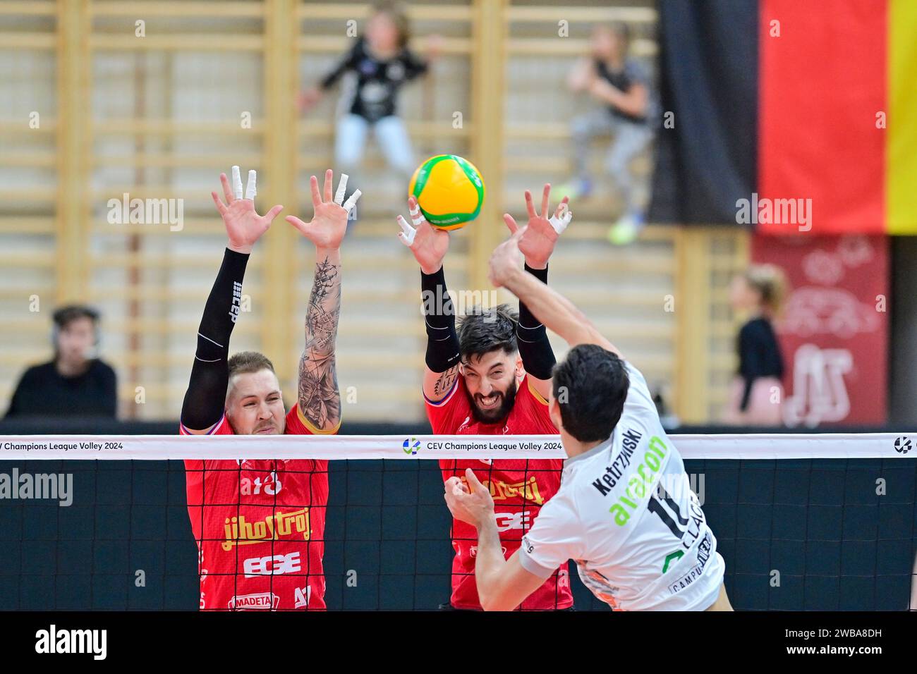 Ceske Budejovice, Czech Republic. 09th Jan, 2024. (L-R) Peter Ondrovic and Ignacio Luengas of Jihostroj and Xander Ketrzynski of Luneburg in action during the men's volleyball Champions League, Group D, 5th round game VK Jihostroj Ceske Budejovice vs SVG Luneburg in Ceske Budejovice, Czech Republic, January 9, 2024. Credit: Vaclav Pancer/CTK Photo/Alamy Live News Stock Photo