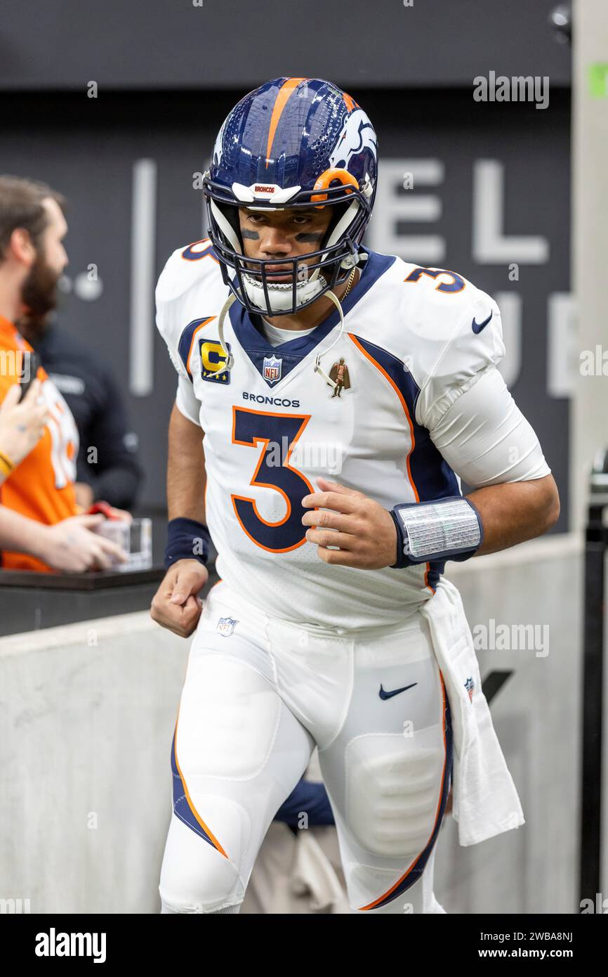 Denver Broncos quarterback Russell Wilson (3) enters the field before ...