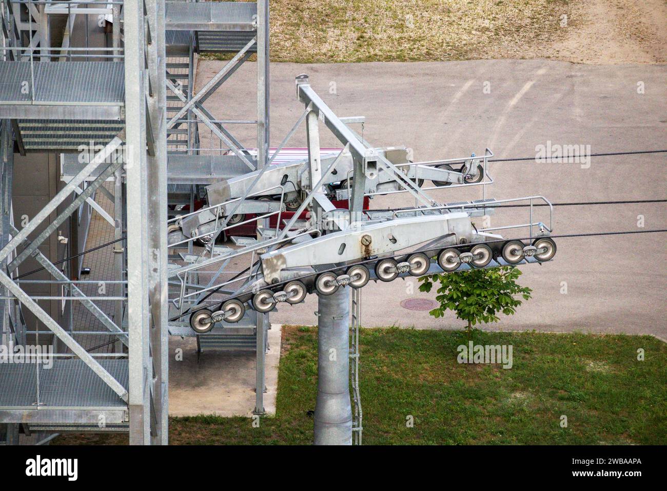 For an aerial car, a lifting mechanism with many wheels on a rope Stock ...