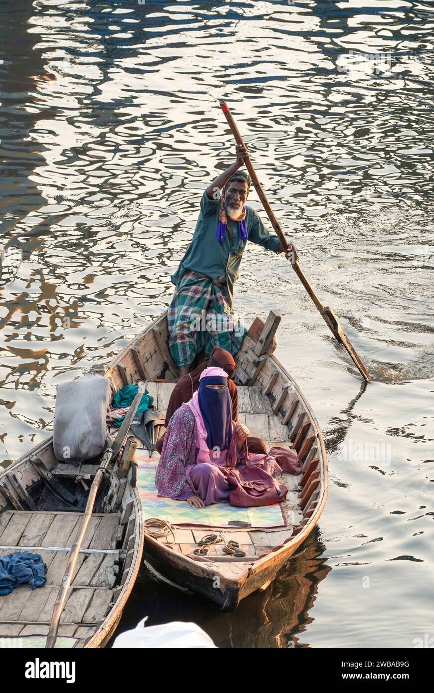 Open wooden ferry boats on the Buriganga River in Dhaka Bangladesh Stock Photo