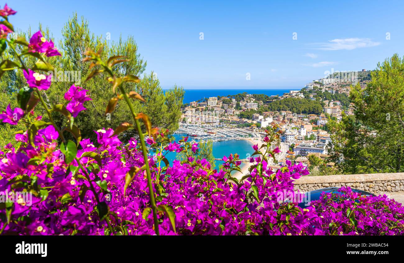 Port de Soller: a stunning snapshot where the UNESCO-protected Tramuntana Mountains meet the tranquil, azure waters of Mallorca's west coast. Stock Photo