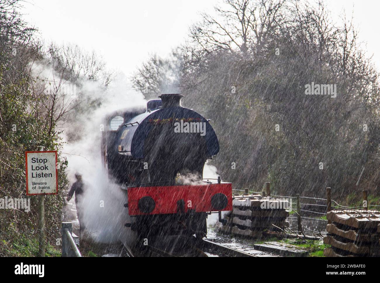 Avon valley heritage steam train Wimblebury Hunslet engine No.3839 changing tracks Bitton near Bristol on a very wet day Stock Photo