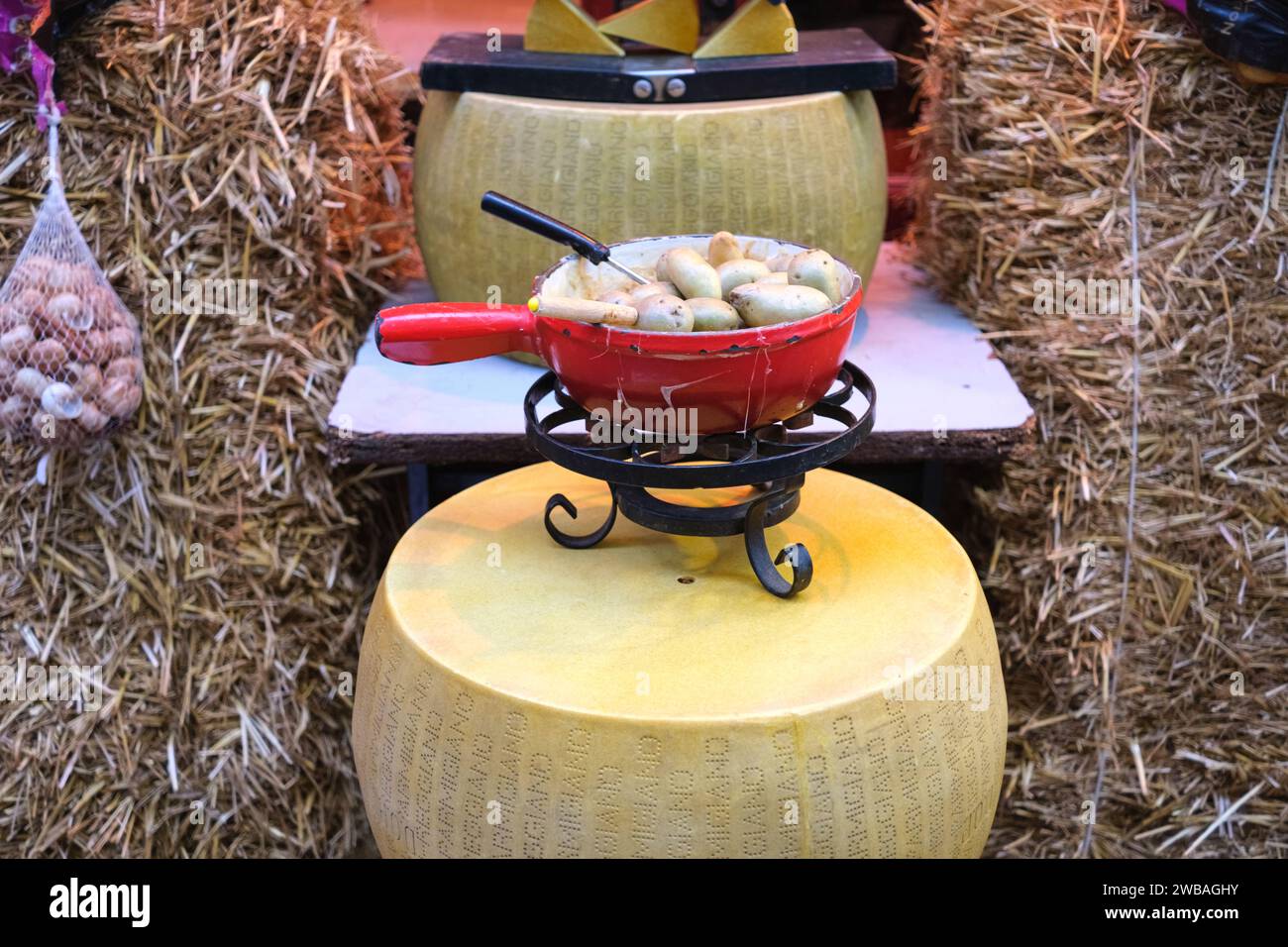 Paris, France December 31, 2023 Italian Padano cheese is used in a