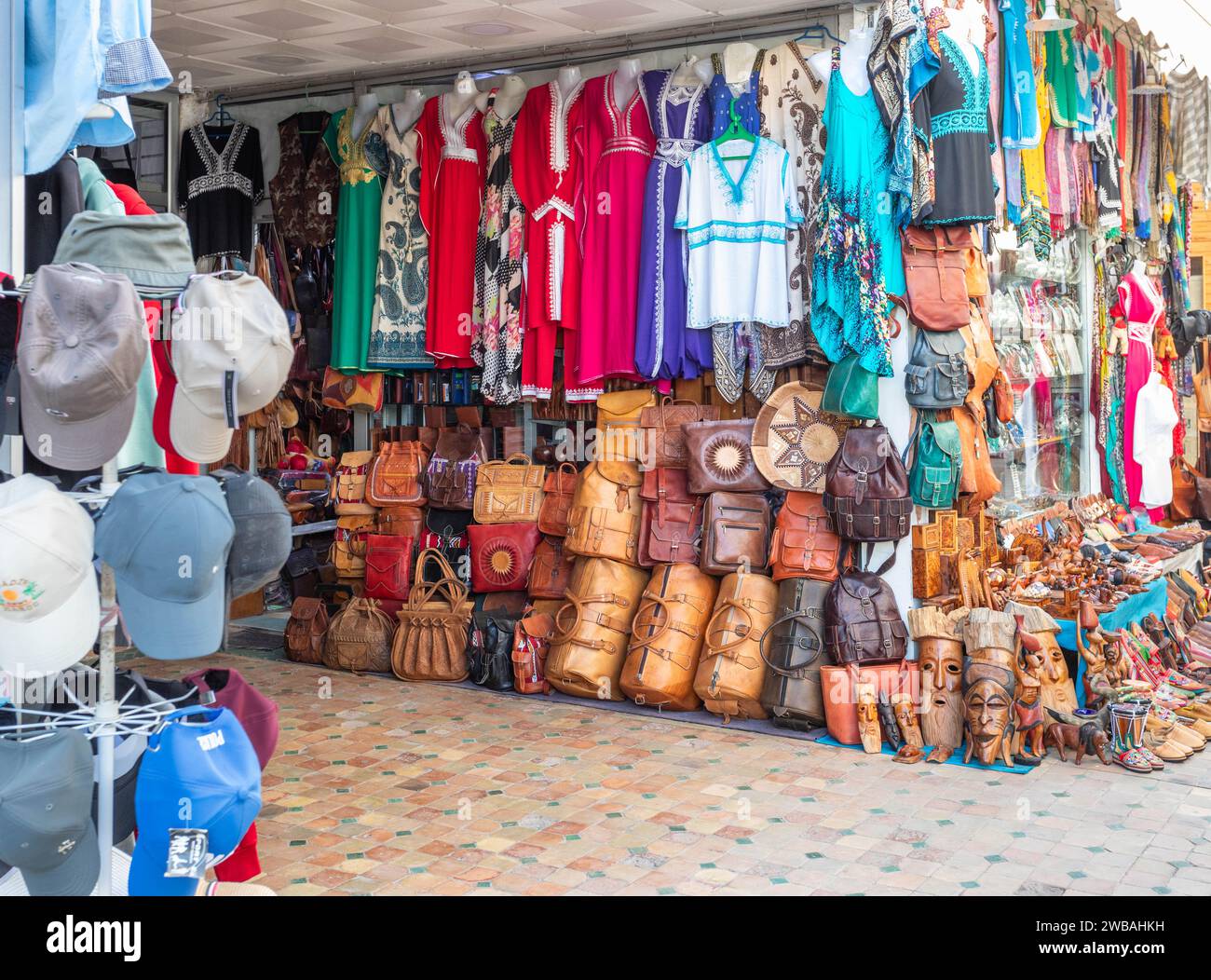Typical souk store selling leather goods, clothing and souvenirs for tourists Stock Photo