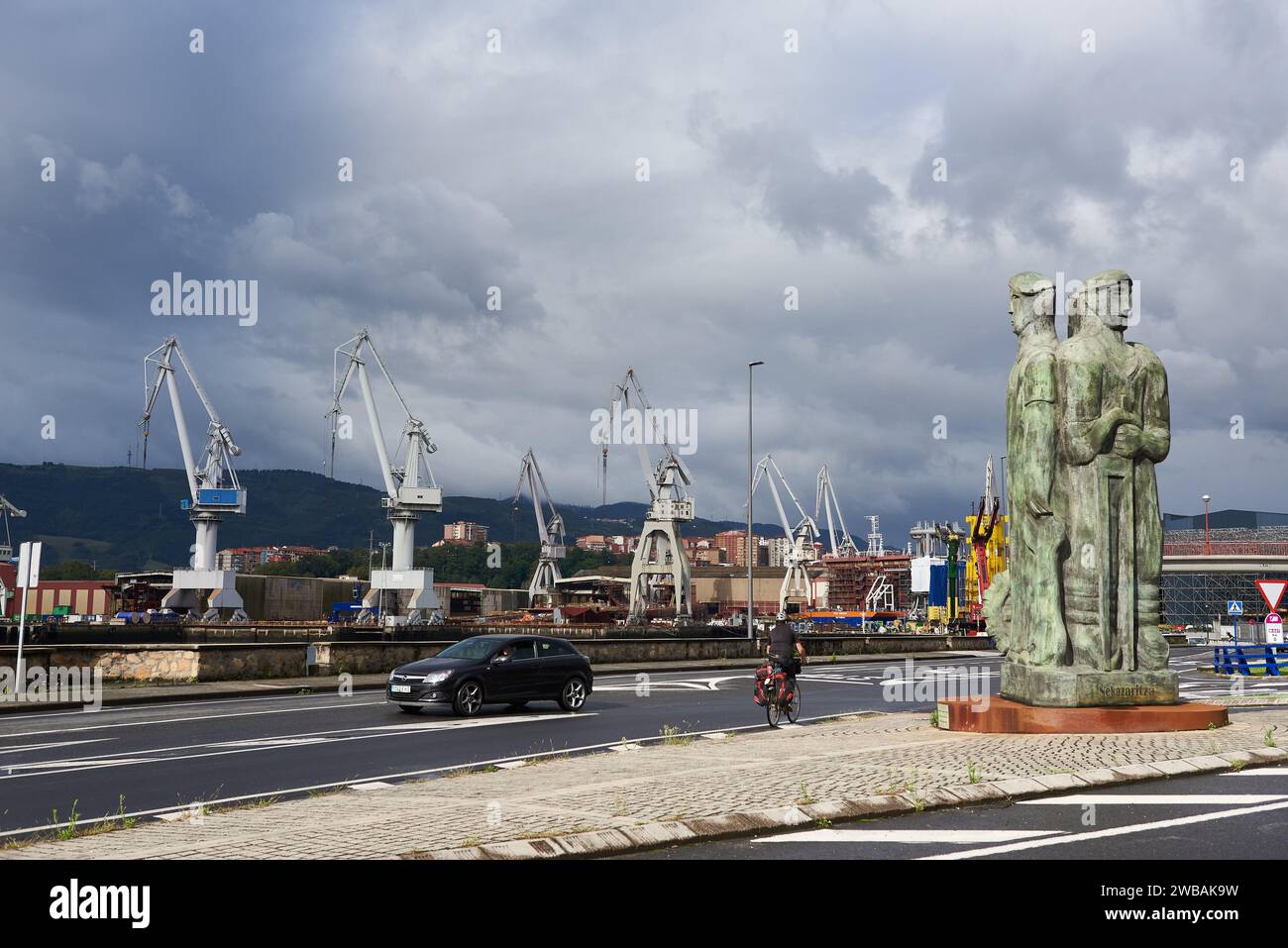 View of the Monument to industry and cranes at Rivera de Axpe, Biscay, Basque Country, Euskadi, Euskal Herria, Spain, Europe Stock Photo