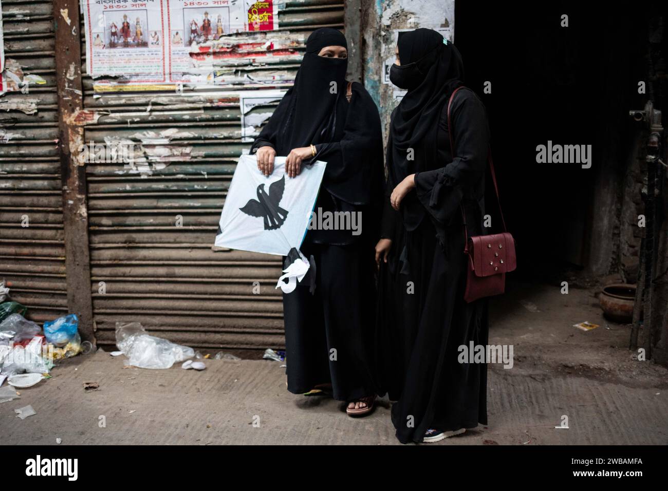 January 9, 2024: Dhaka, Bangladesh: Muslim women buying kites, spool ...