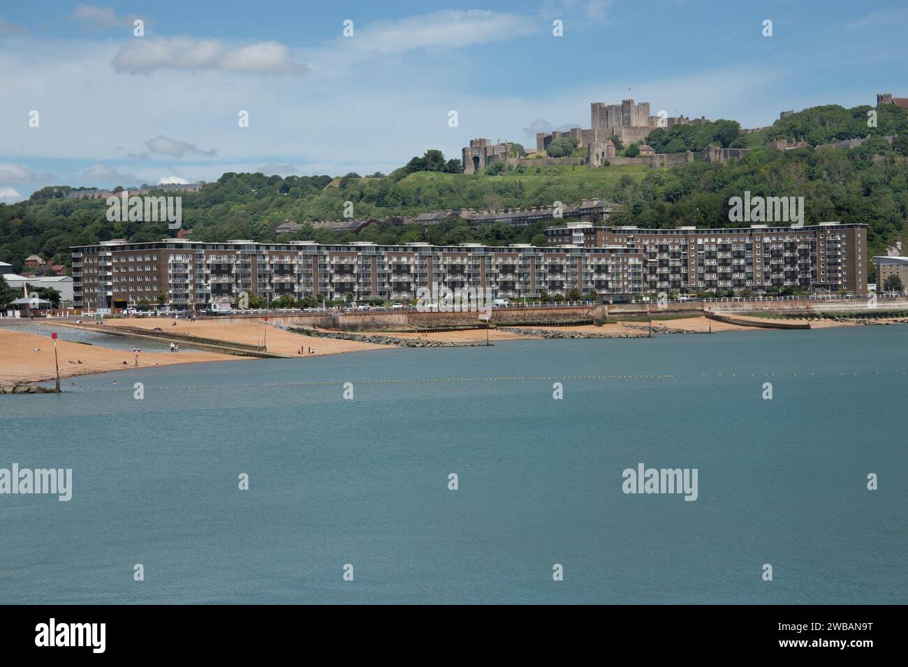 Dover sea front beach seafront buildings and promenade with castle