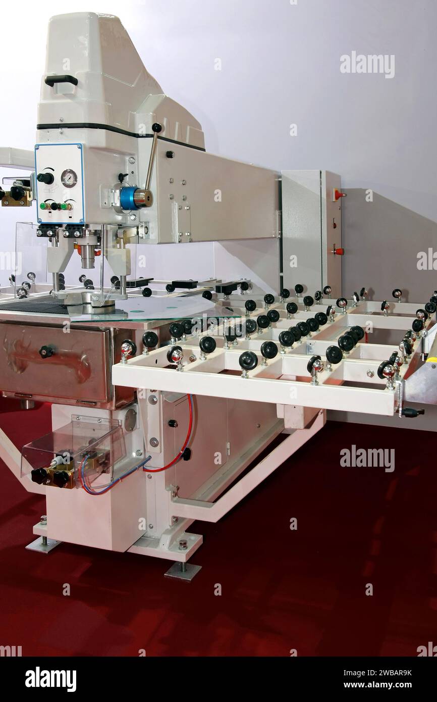 Large Machine Big machine for cutting and processing glass Stock Photo - Alamy