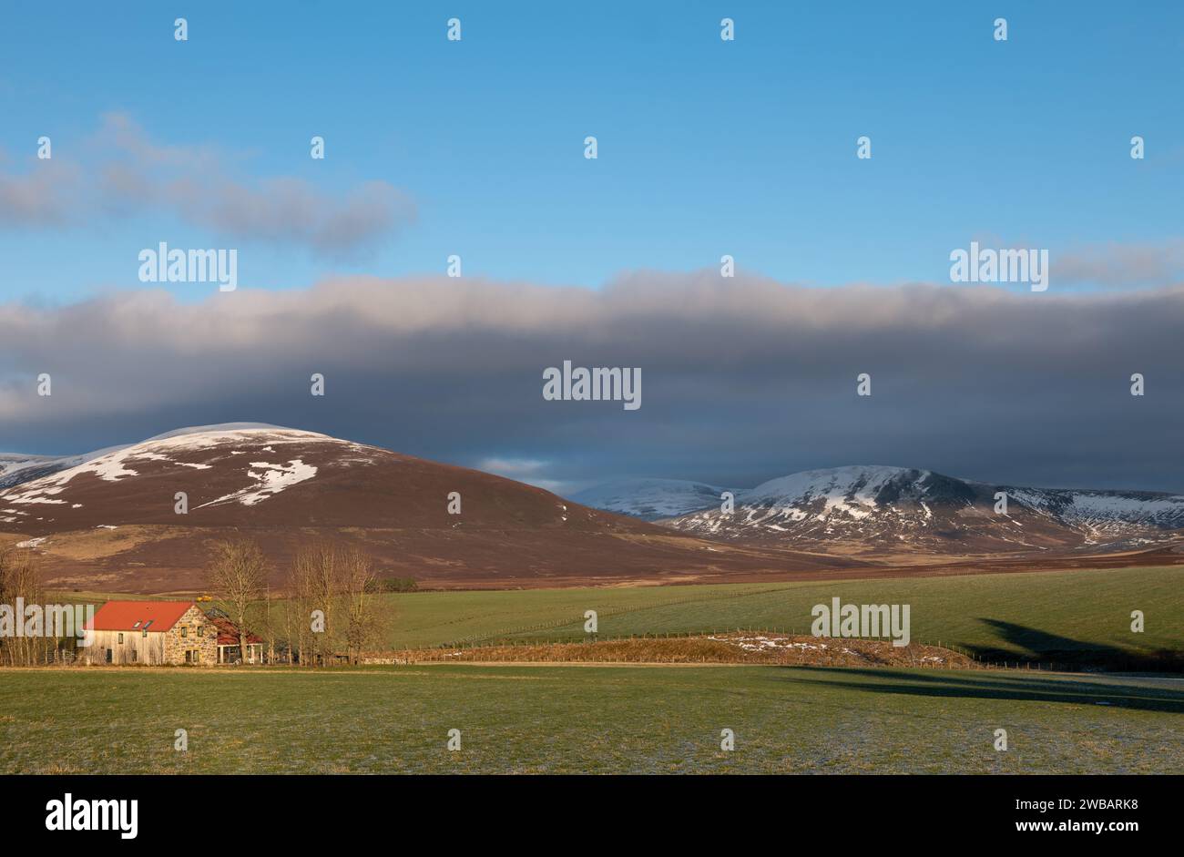 9 January 2024. Chapeltown, Moray, Scotland. This is view from the Chapeltown at Ballindalloch towards the hills of the Cabrach with clouds forming Stock Photo
