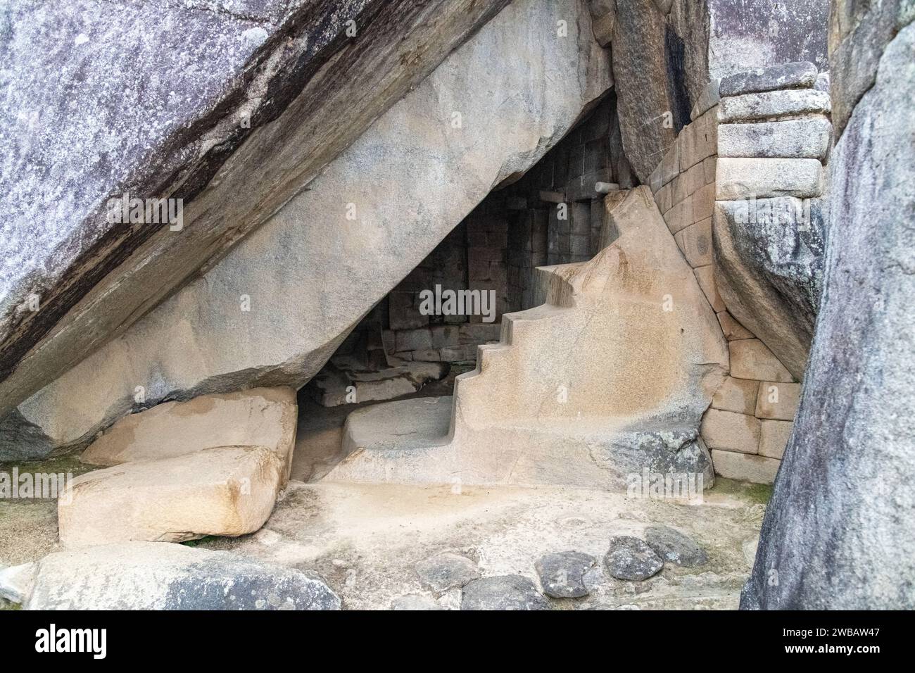 Empty granite stone building structures at Machu Picchu in Peru Stock Photo