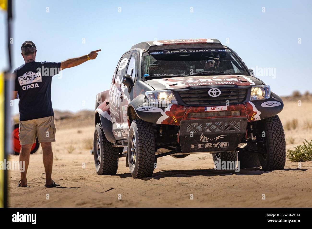 Chami, Mauritania. 08th Jan, 2024. ATTENTION EDITORS - HAND OUT PICTURES - EDITORIAL USE ONLY - MANDATORY CREDIT: 'ALESSIO CORRADINI ' Hand out pictures released by ALESSIO CORRADINI shows Pascal Feryn and Kurt Keysers and their car at the 2024 Africa Eco Race in Chami, Mauritania, on Monday 08 January 2024. *** Belga and Belga Editorial Board decline all responsibility regarding the content of this picture. *** PHOTO HAND OUT ALESSIO CORRADINI Credit: Belga News Agency/Alamy Live News Stock Photo