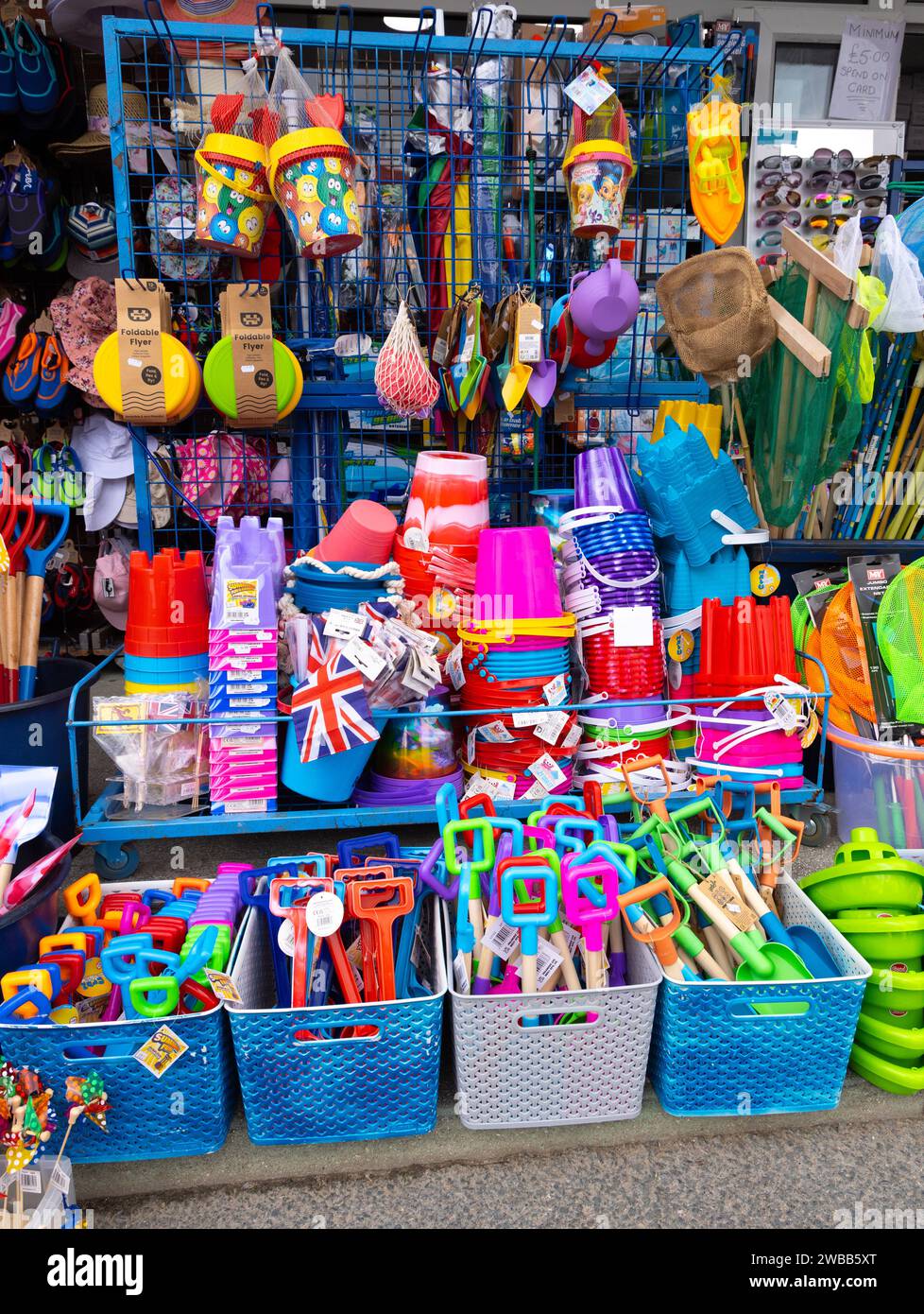 Shop display of colour Kids Play Sand and beach Toys Stock Photo