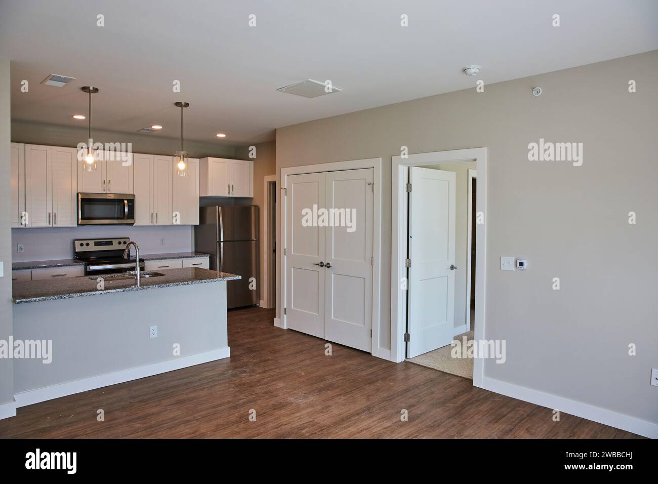 Modern Kitchen with Island and Open Living Space, Eye-Level View Stock ...