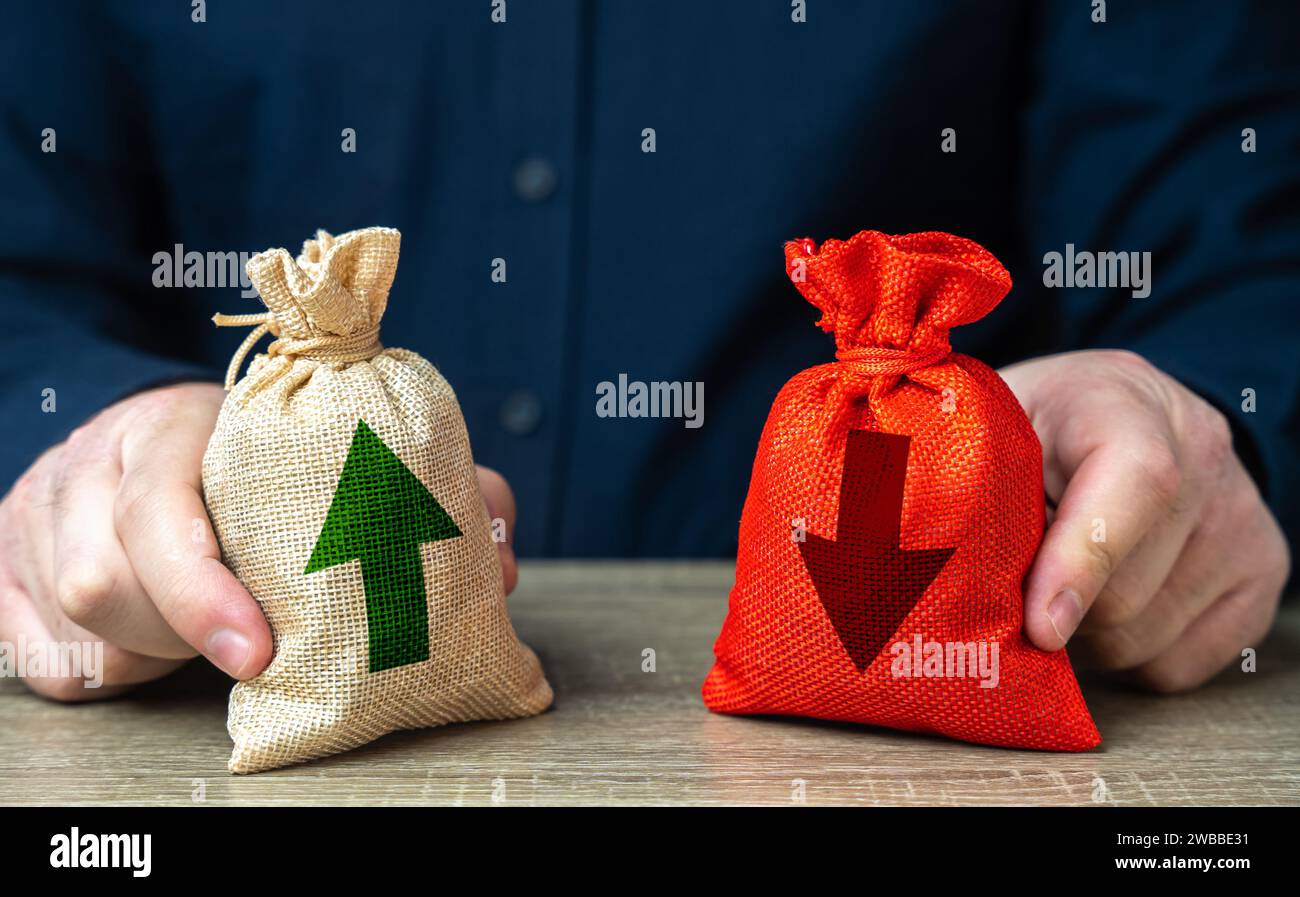 Positive and negative properties and qualities. Two bags with an up and down arrow. Risk planning. Advantages and disadvantages. Evaluating profit and Stock Photo