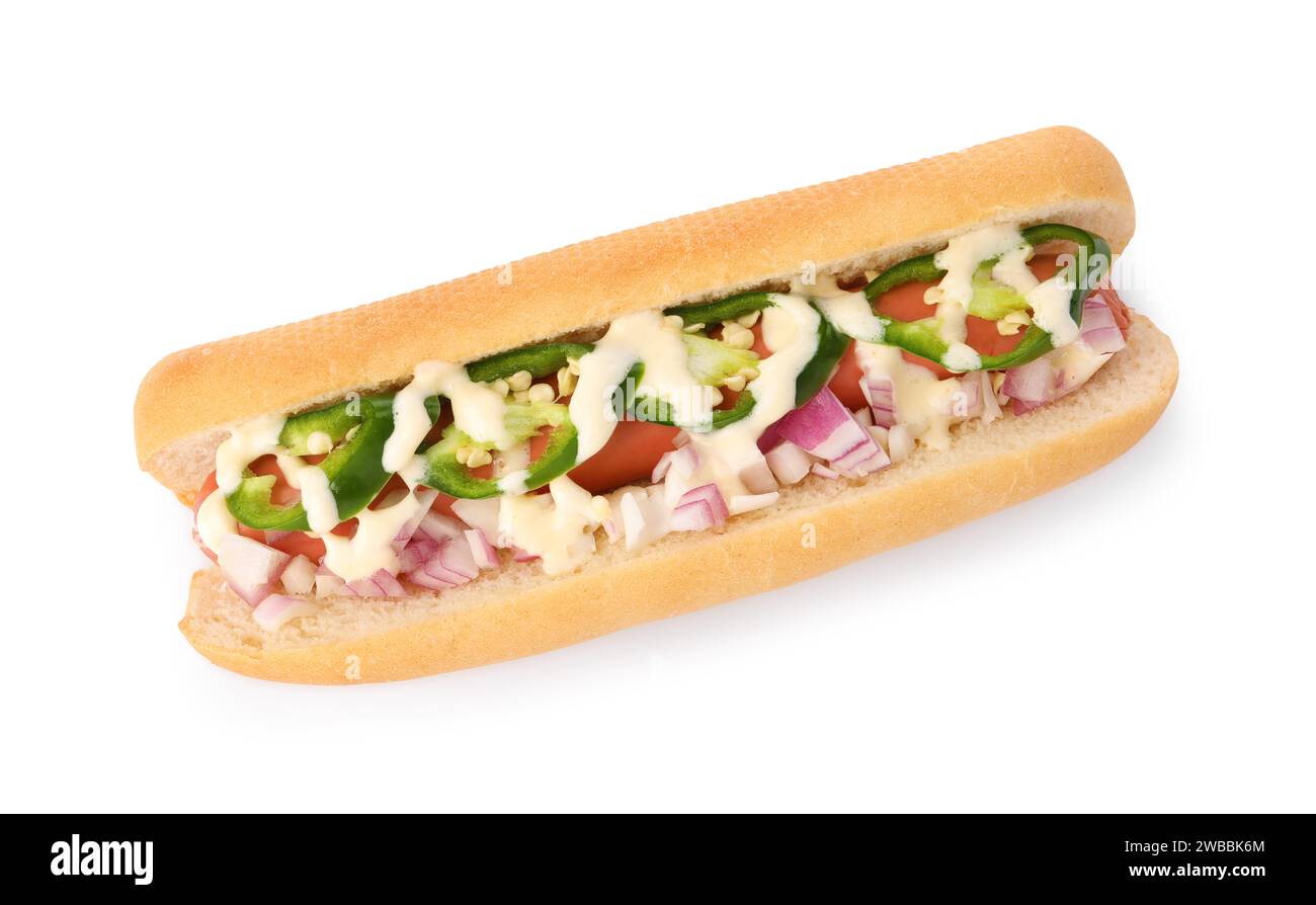 Delicious hot dog with onion, chili pepper and sauce isolated on white, top view Stock Photo