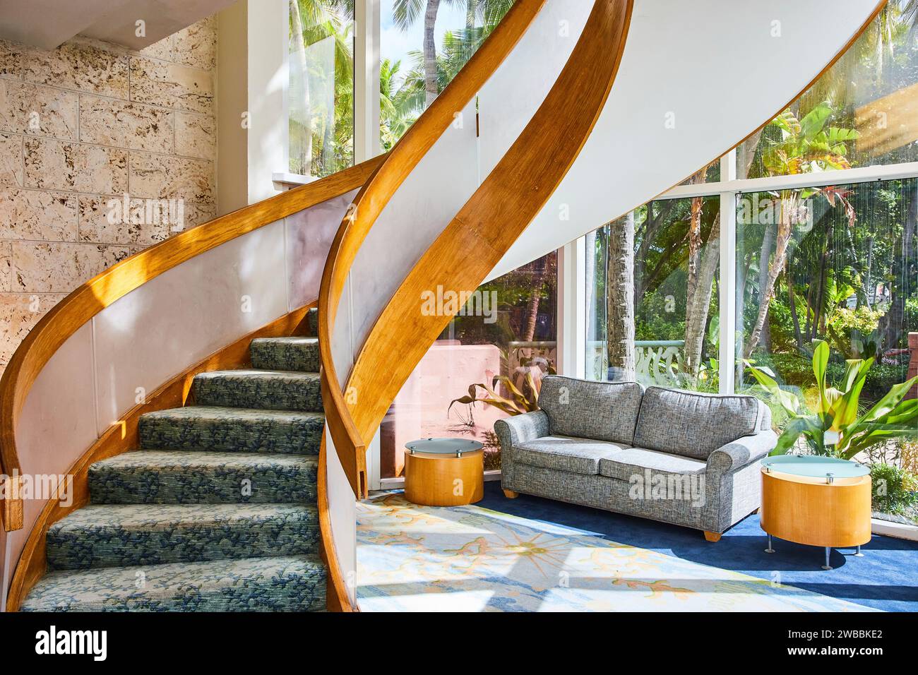 Luxurious Spiral Staircase and Lounge in Modern Interior Stock Photo ...